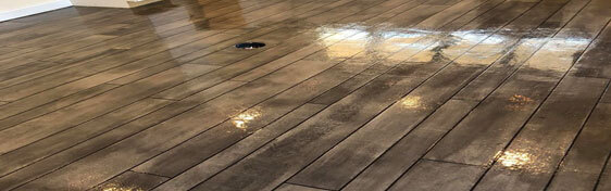This image shows a floor that has a wood stain coating.