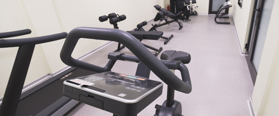 This image shows a gym with an epoxy floor.