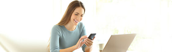This image shows a lady using her phone.