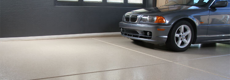 This image shows a garage with a flake epoxy floor.