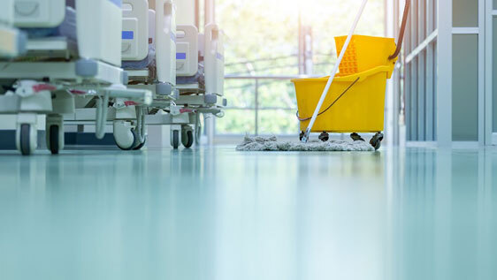 maintain-commercial-epoxy This image shows a hospital floor that is being cleaned.