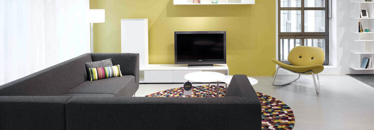 The image shows a living area with nice epoxy flooring floor