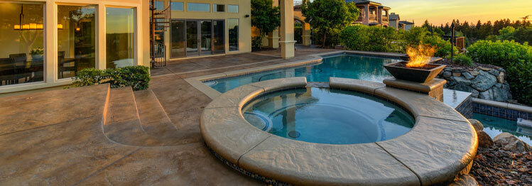 This image shows a pool with a newly resurfaced deck.